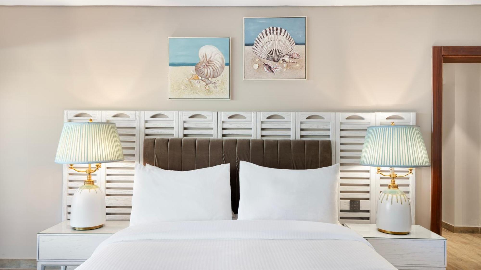 Rixos Premium Alamein Ελ Αλαμέιν Δωμάτιο φωτογραφία A bedroom at Hilton Garden Inn