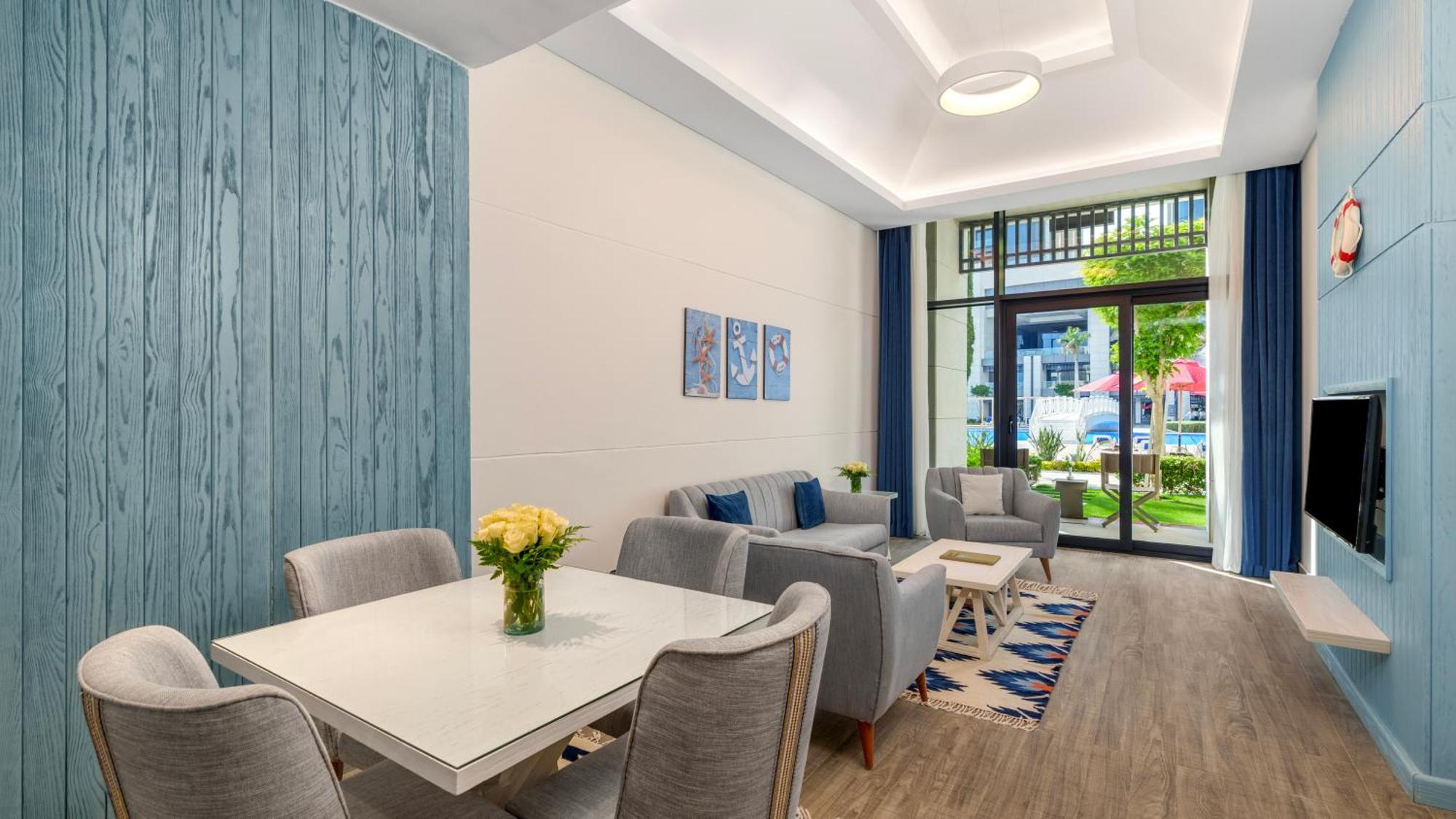 Rixos Premium Alamein Ελ Αλαμέιν Δωμάτιο φωτογραφία A staged living room