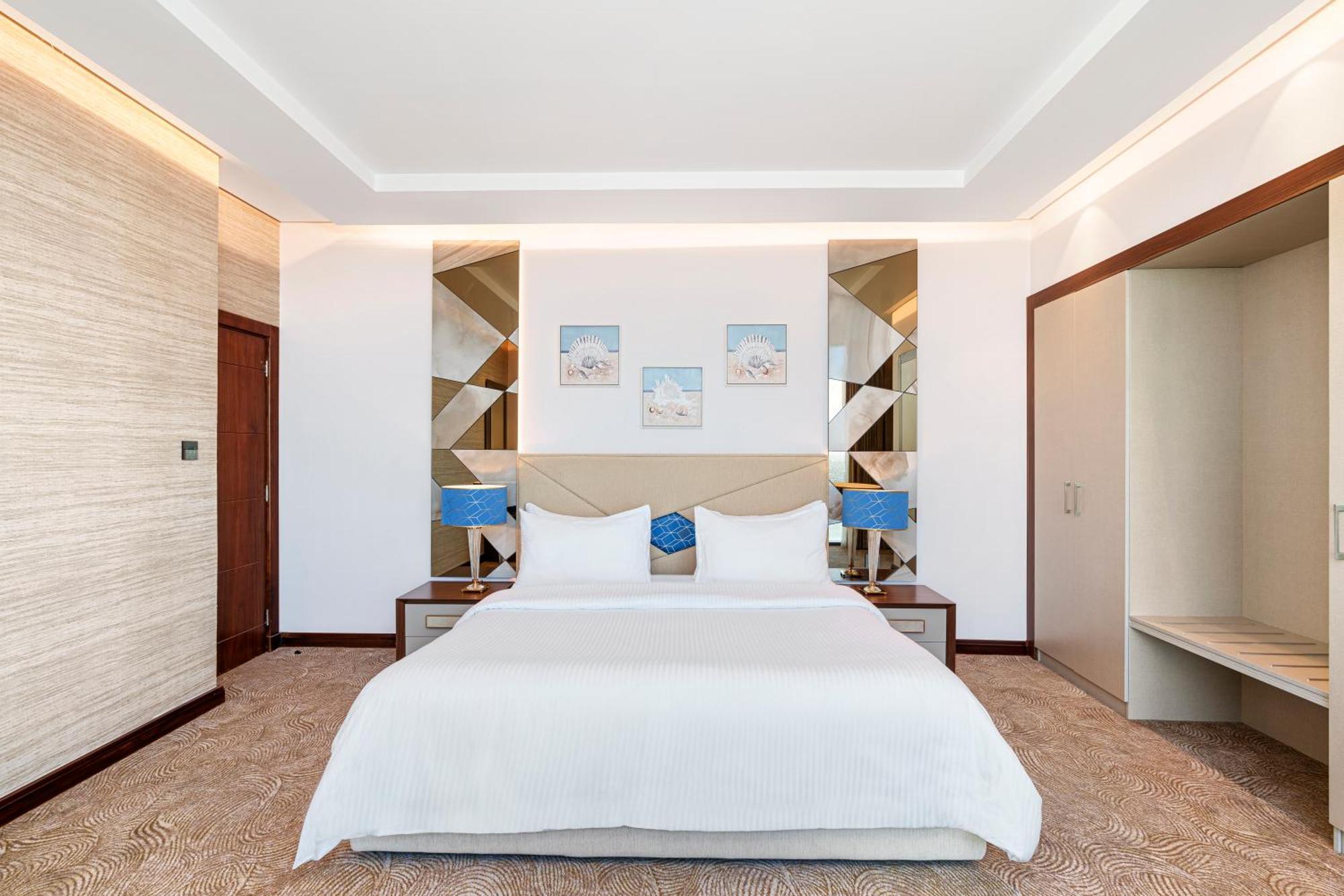 Rixos Premium Alamein Ελ Αλαμέιν Δωμάτιο φωτογραφία A bedroom at the hotel
