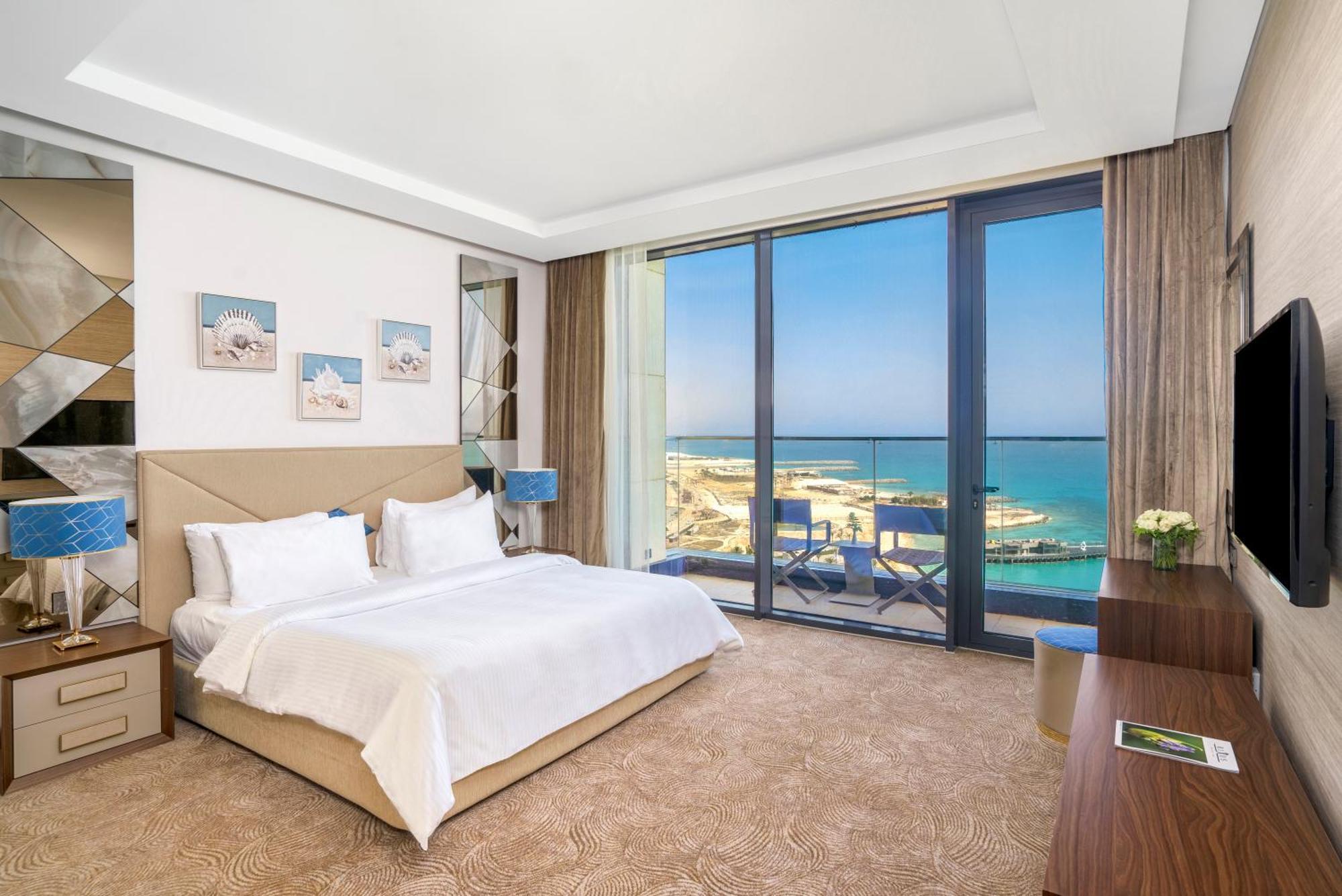 Rixos Premium Alamein Ελ Αλαμέιν Δωμάτιο φωτογραφία A bedroom at the hotel